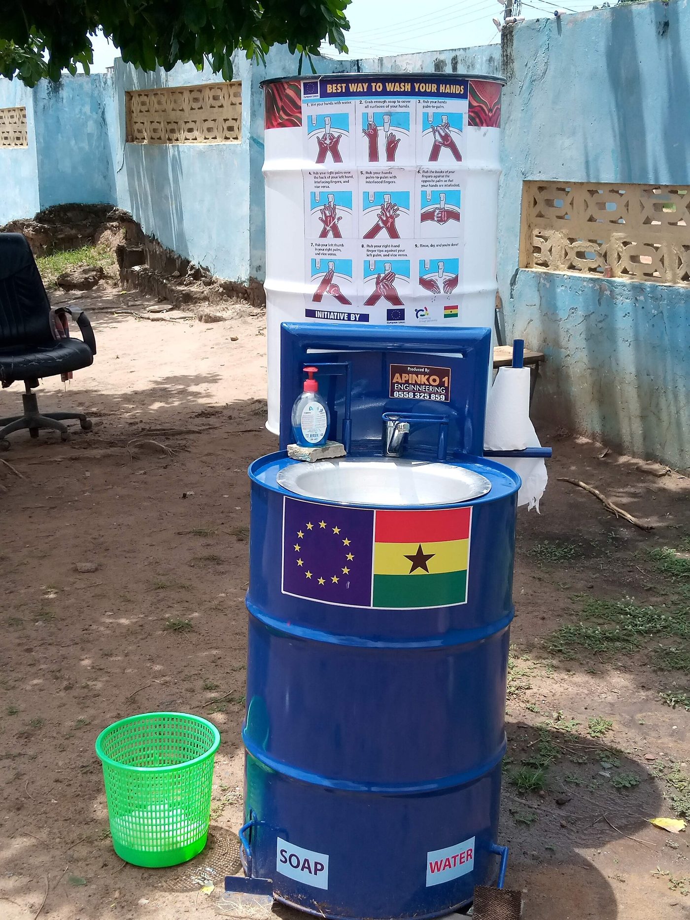 A foot-pedal handwashing station built from a steel drum