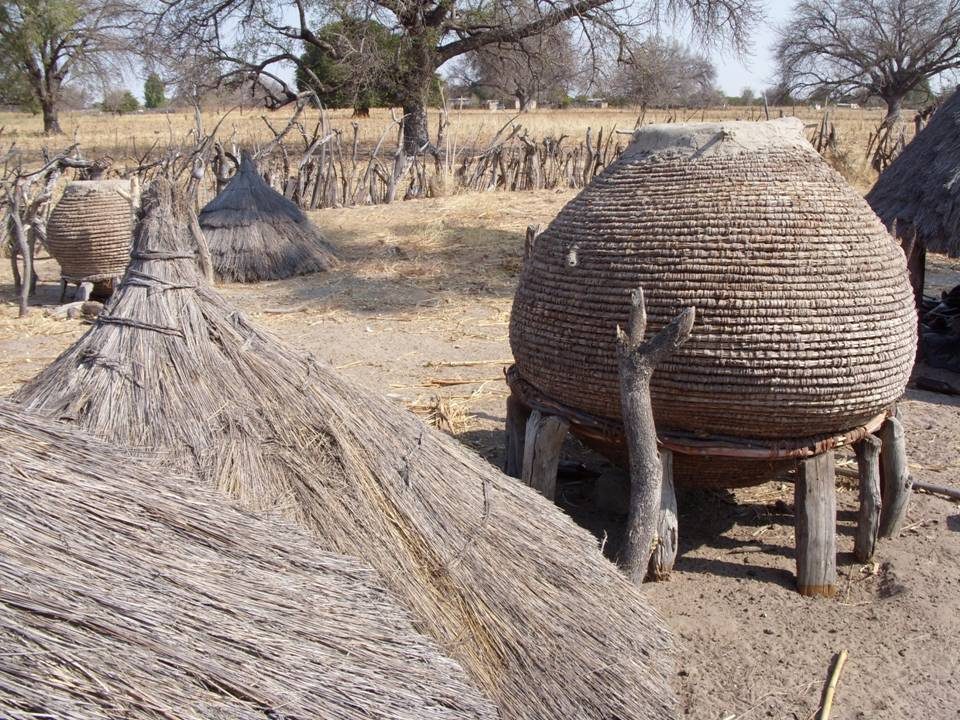 A woven raised grain storage basket used for pearl millet