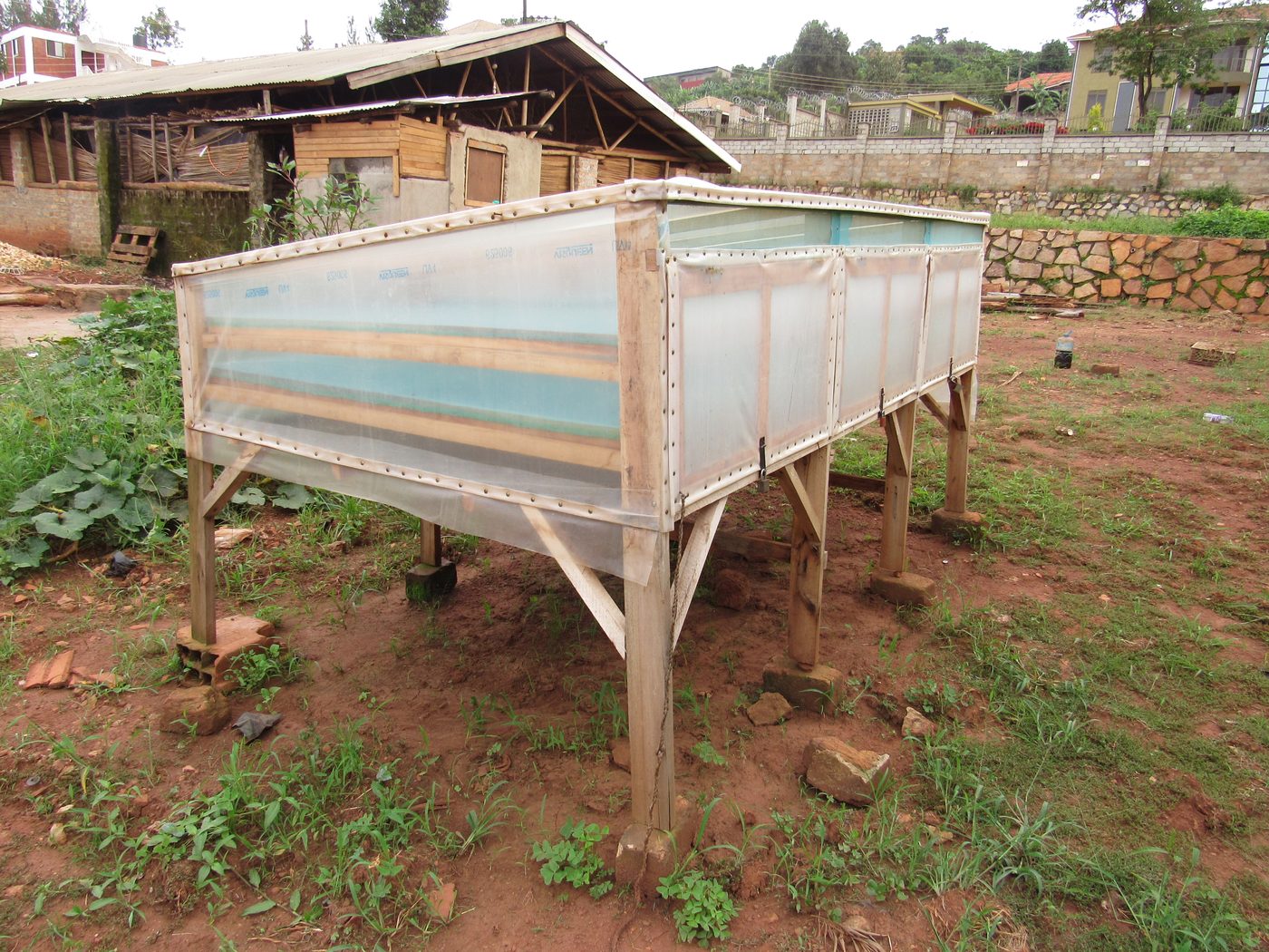 Raised solar food drier with glazed lid used to dry fruit and vegetables in Uganda